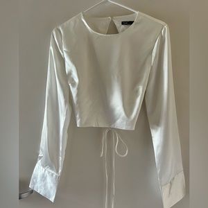 Long sleeve white satin crop top with open back